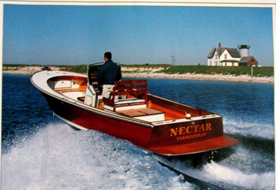 WoodenBoat '03 Cover Boat
The Monomoy Angler, LOL 25'6" Beam 8'6"  Deadrise in degrees: bow 49, amidships 22, transom 19.
