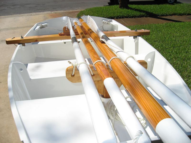 MAST, BOOM AND OAR CRUTCH FOR D5
Bow on shot.  One crutch fits into the PVC mast step well and the second is bolted to a two x four.  That 2x4 is bolted to the oar locks.  Everything is laced.  Aft crutch has Vs cut into the crutch to accept the blades of the oars.  
Keywords: D5 CRUTCH