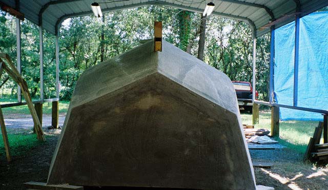 Inverted Hull
Boat on blocks after turn over.
