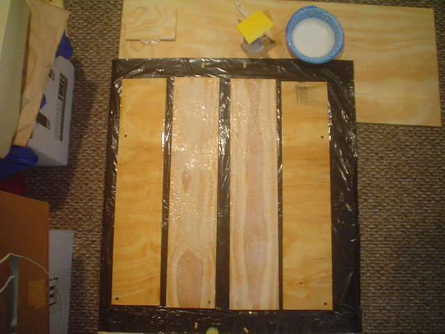 Tabernacle sides laminated with plywood using dowels
Two dowels used for each side.  Epoxy on both parts, and epoxy/West403 blend on the cypress pieces, ready to squish and dowel.
