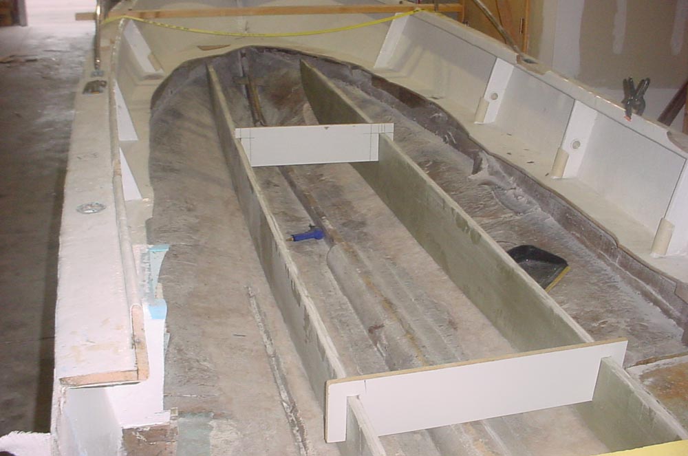 stringers cut to correct height, held in place with braces for glassing
