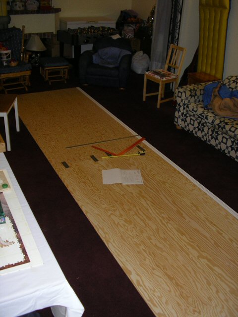 Ready, set... GO!
The boards laid out on the basement floor ready for measure and mark.

