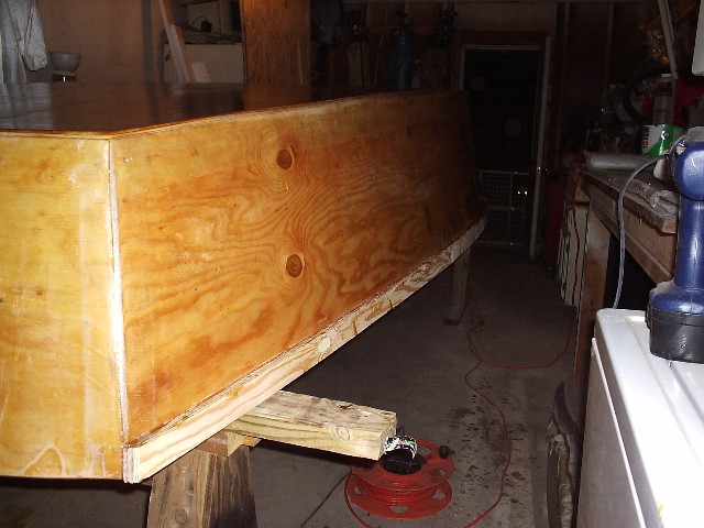 Portside from transom, now sanded and 2nd coat of epoxy applied.
