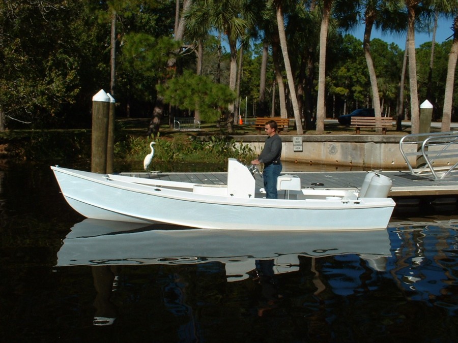 12/1/05    Commandeered a passerby for the helm and used two plastic tanks with 30 gallons of water to simulate the engine ballast..with fuel and baitwell full it should float nice and level....the Egret joined us on his own..
