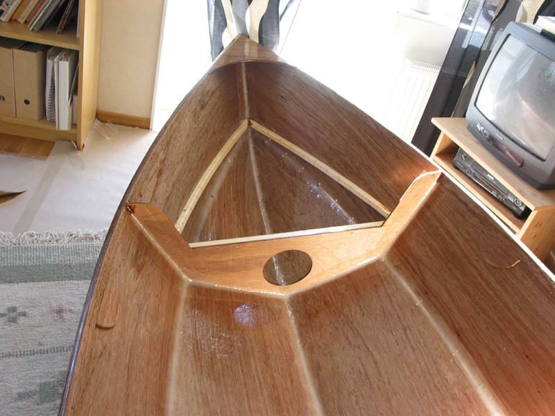 rubrail is now rounded over and coated in epoxy.  I glued battens for seat supports
