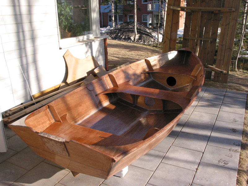 boat actually looks nice in wood finish,  but I will paint most of the hull and leave some wood details much like the v12 made by douglas.  I cut the transom down a bit (to 15") and added a motor pad.
