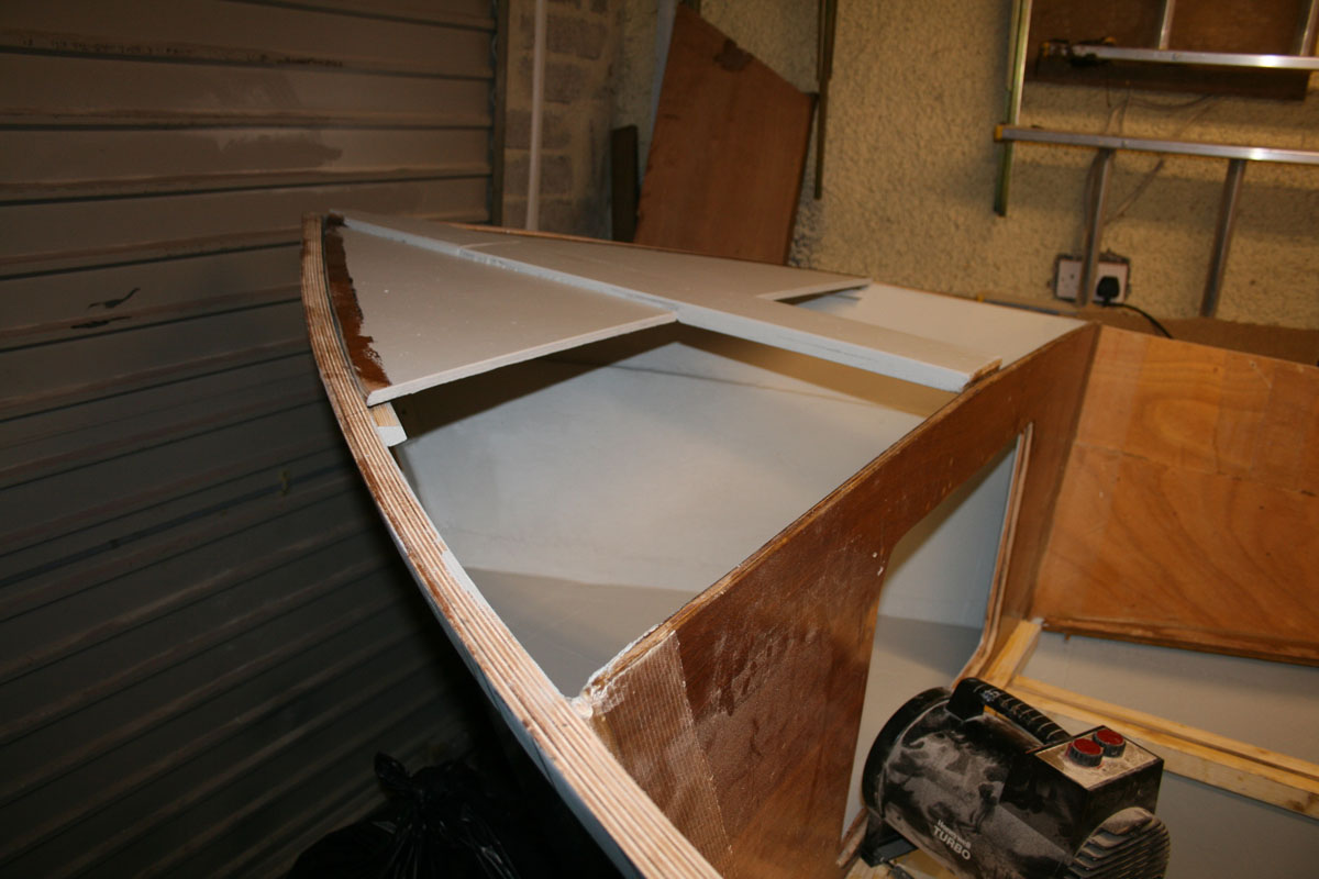 2 coats of locker/bilge paint in these
breast hook assembly is upside down to dry here
