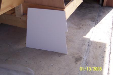 Went to my local office supply store and bought a sheet of white board 1/4" thick to care fully measured and cut the pattern.

Worked great for $14.00

