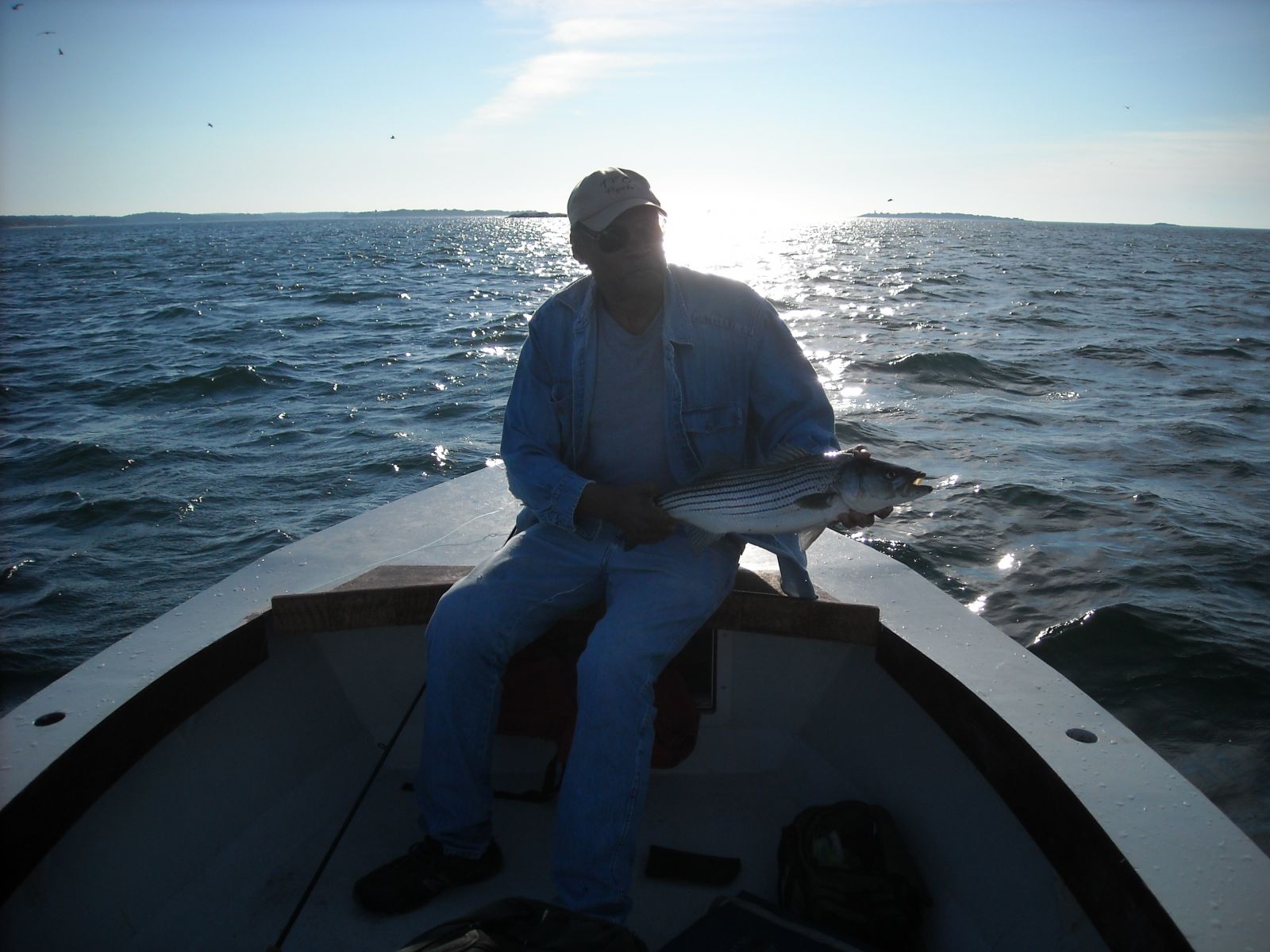 FS17 and Fish Mojo!
First fish on the boat. Small 23" striper
Keywords: first fish