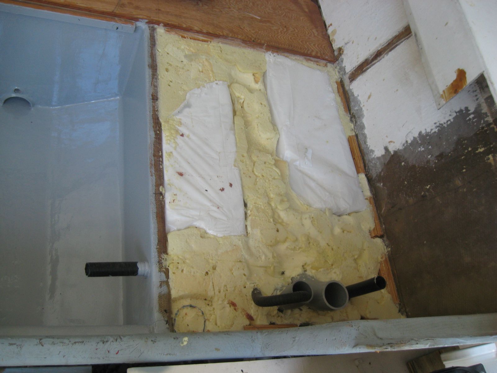 Starboard side rear foamed in
plastic wrapped bead foam blocks visible in pic used to take up space...
