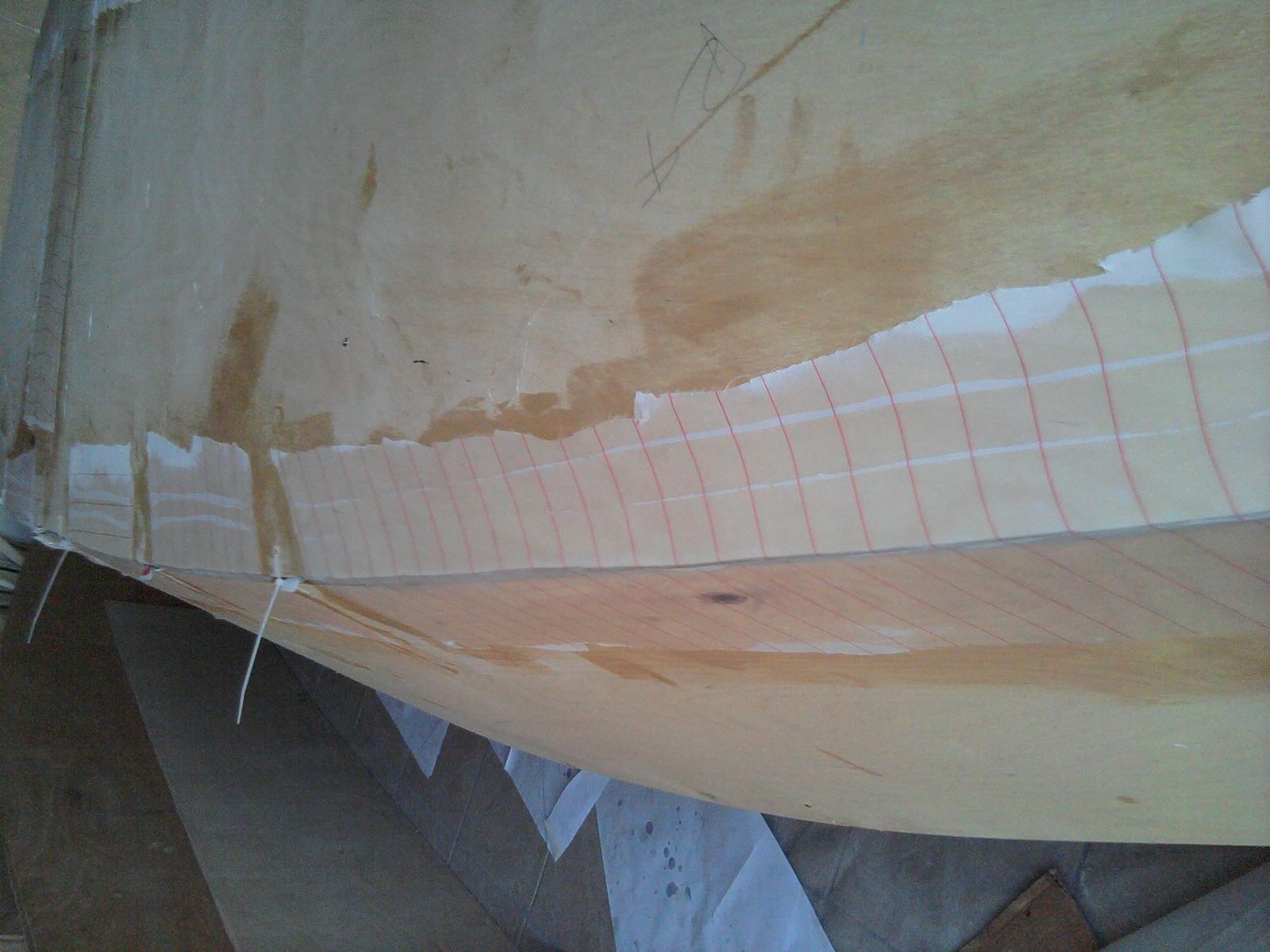 Peel Ply
Having completed all the seams Wet on Wet I cover them with peel ply
The final result was excellent

Builders note.
If you can afford it us the real thing the poor mans peel ply leaves a shiny finish, it may look nice but..and you have to sand it down in order to proceed so same some time and effort and us the real thing

