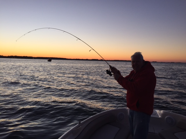 My 83 year old dad catching rockfish in Chesapeake Bay
