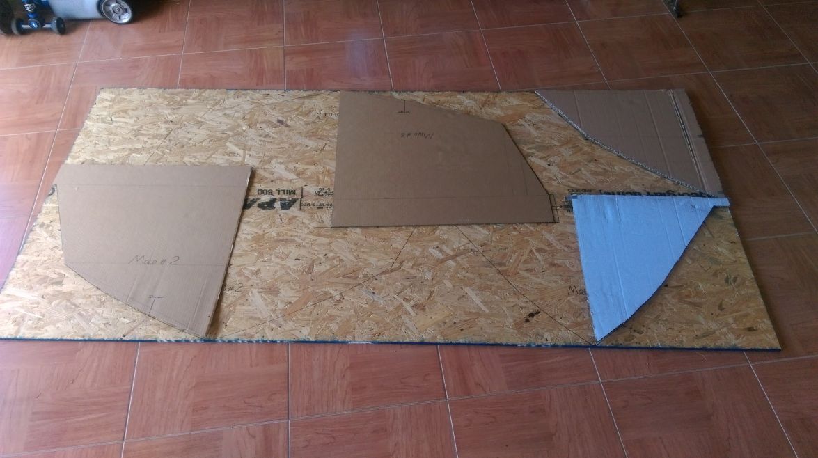 Uses cardboard half sections of mold to nest into a sheet of particle board
